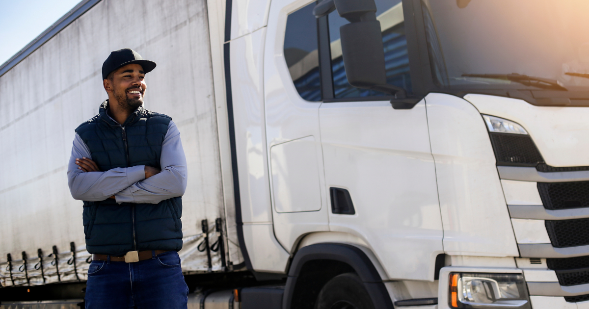 Man standing in front of truck